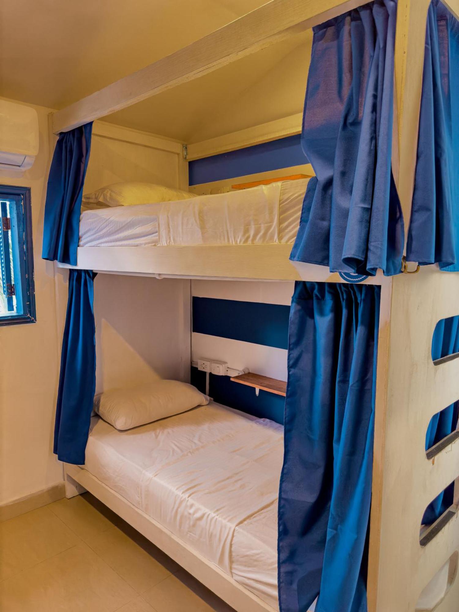 Casa Del Puerto Hostel & Suites Картахена Номер фото
